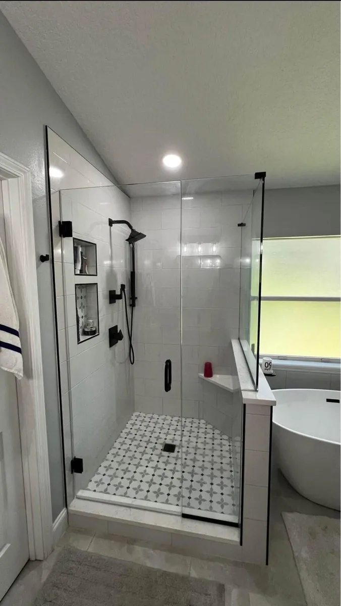 Tub surround tile renovation by Braga Remodeling