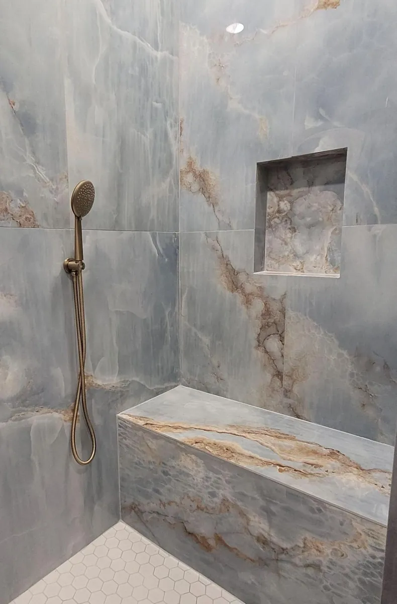 Blue custom shower tile detail by Braga Remodeling