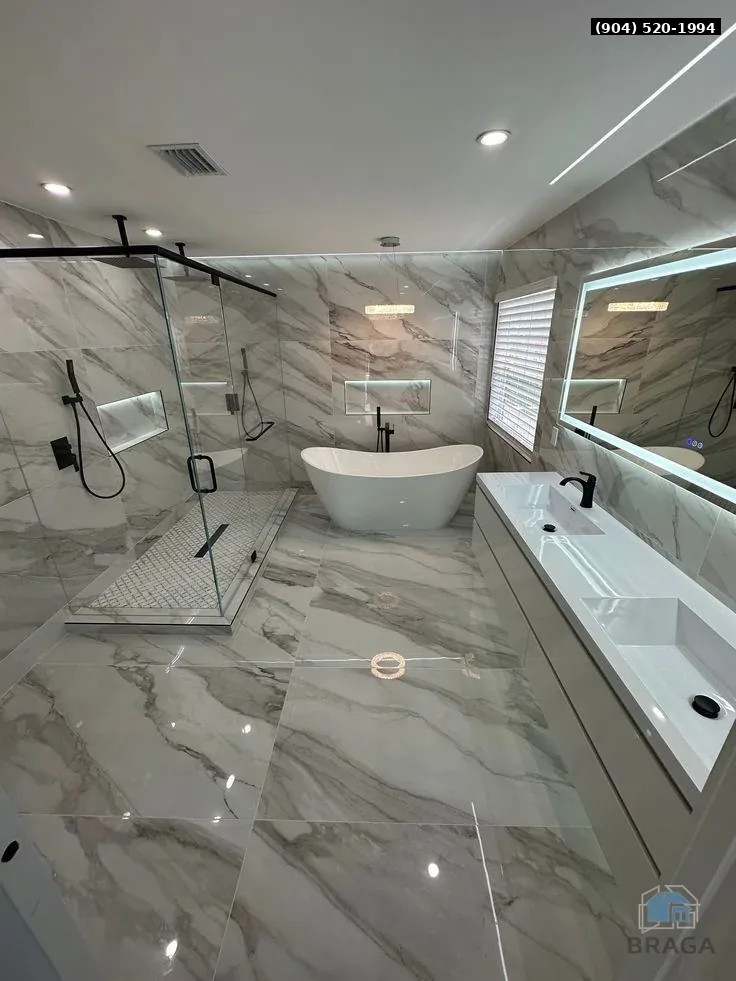 Marble spa shower remodel in Jacksonville by Braga Remodeling