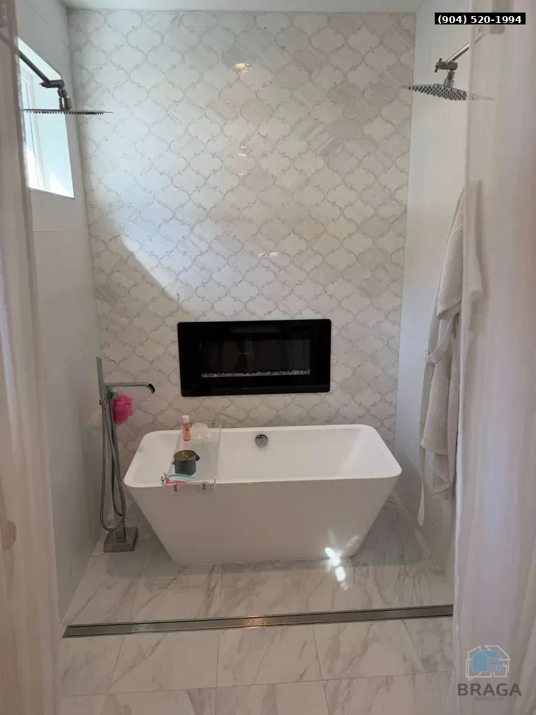 Grey spa bathroom tile in Nocatee by Braga Remodeling